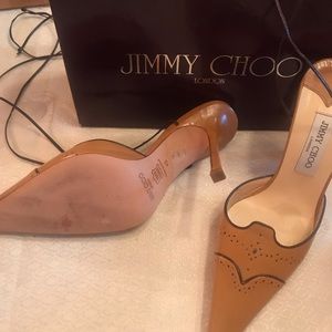 Jimmy Choo heels tie at the ankle